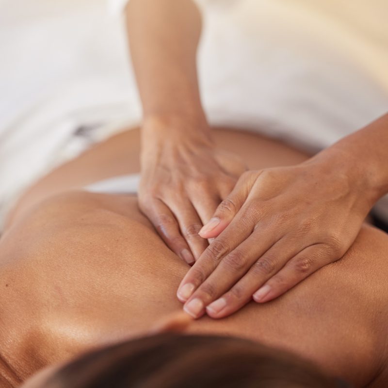 Woman at spa for massage with therapist and holistic treatment, wellness and self care with aromath